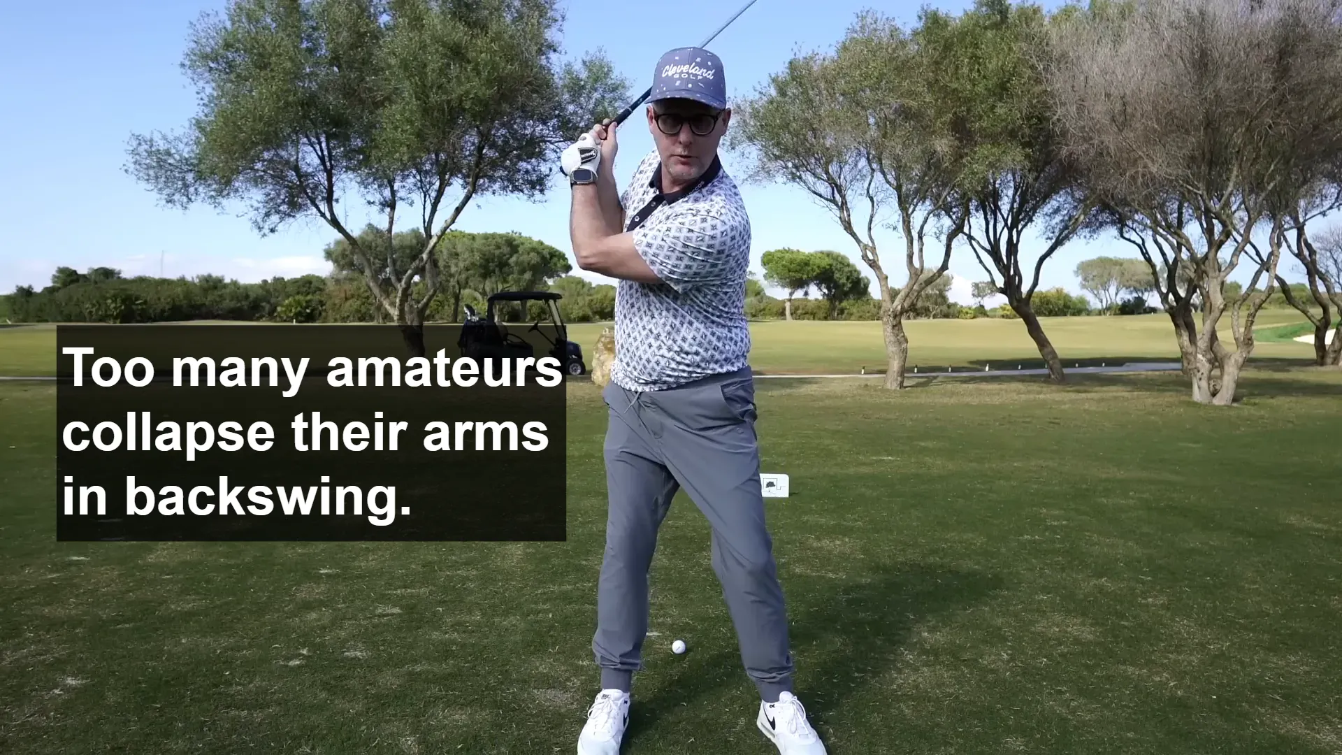 Collapsed arms in backswing Amateur golfers collapse their arm in backswing.